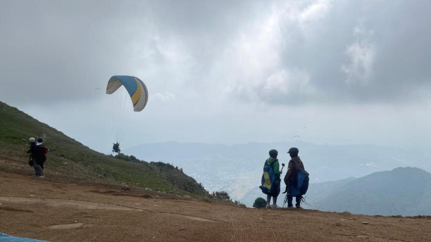 Paragliding — Soar above the Himalayan skies